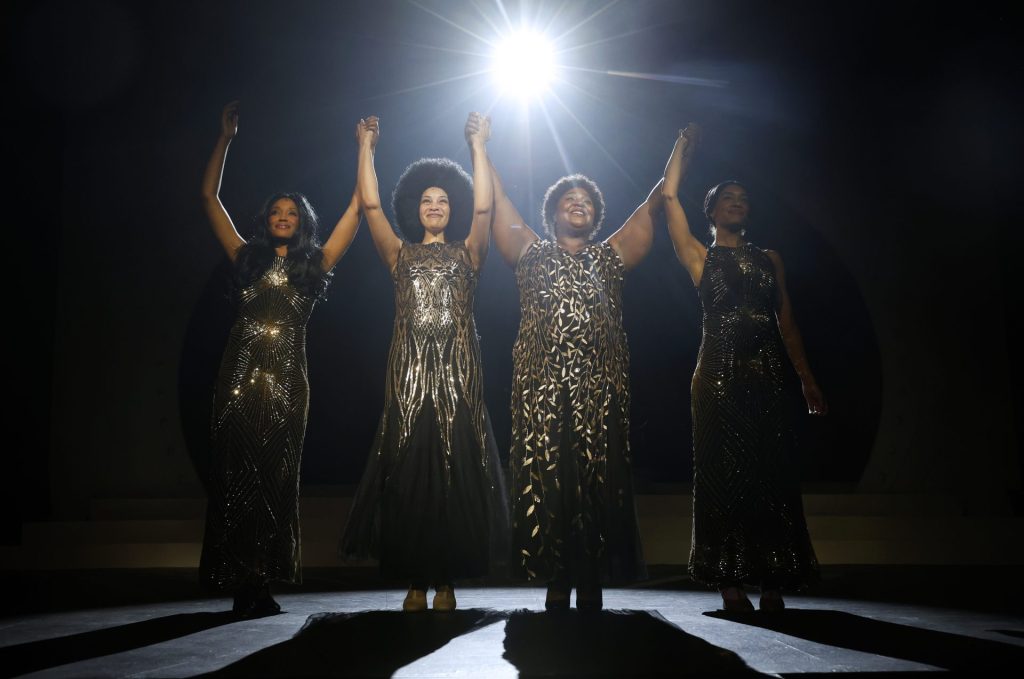 "Dreamgirls" at The Grand: Where Black Brilliance Takes Center Stage 2 Kimberly Teitter, Kandyce Marie, Quesley Soto, & Darby Mest, actors playing the leads in Dreamgirls at The Grand Theatre standing holding hands