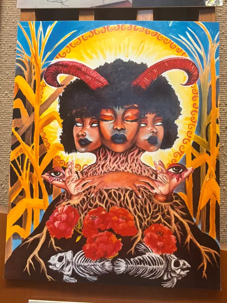 Painting of three heads